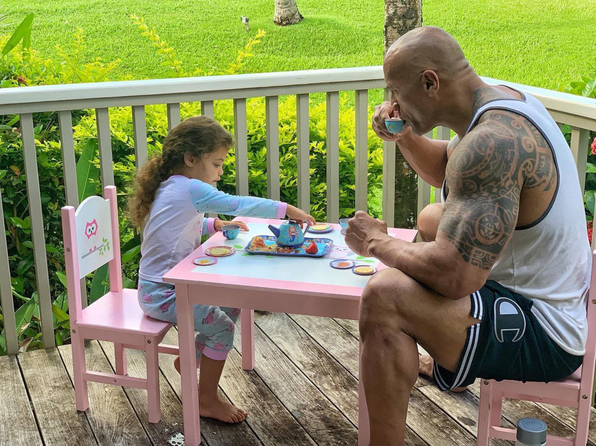 Dwayne Johnson enjoys tea time with his daughter