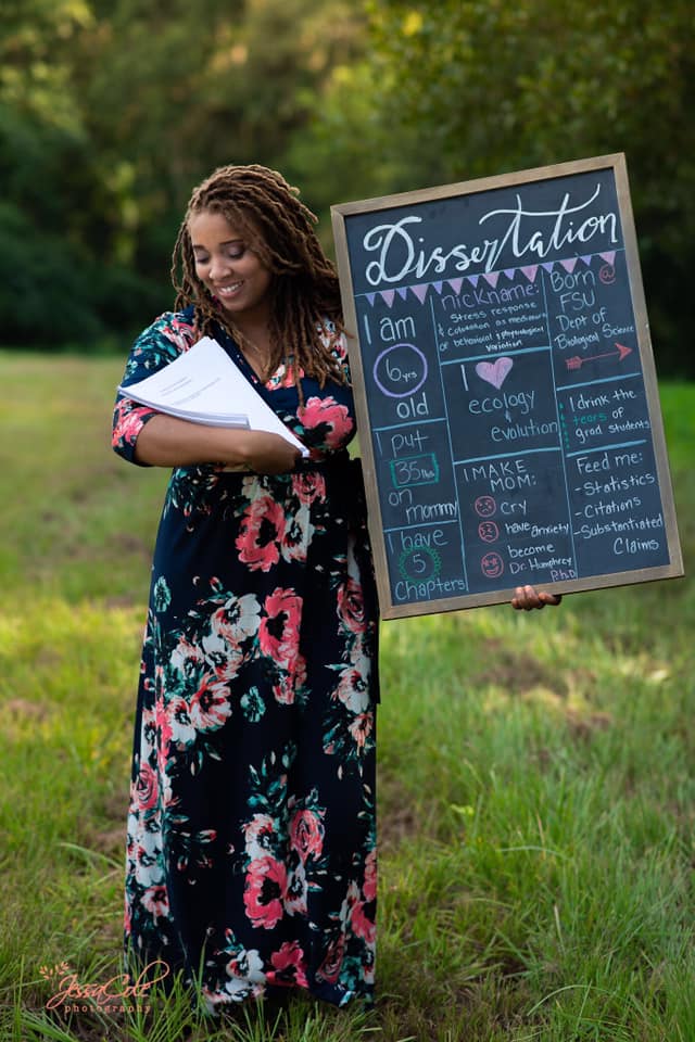 Florida woman goes all out in baby shoot with dissertation after completing her PhD