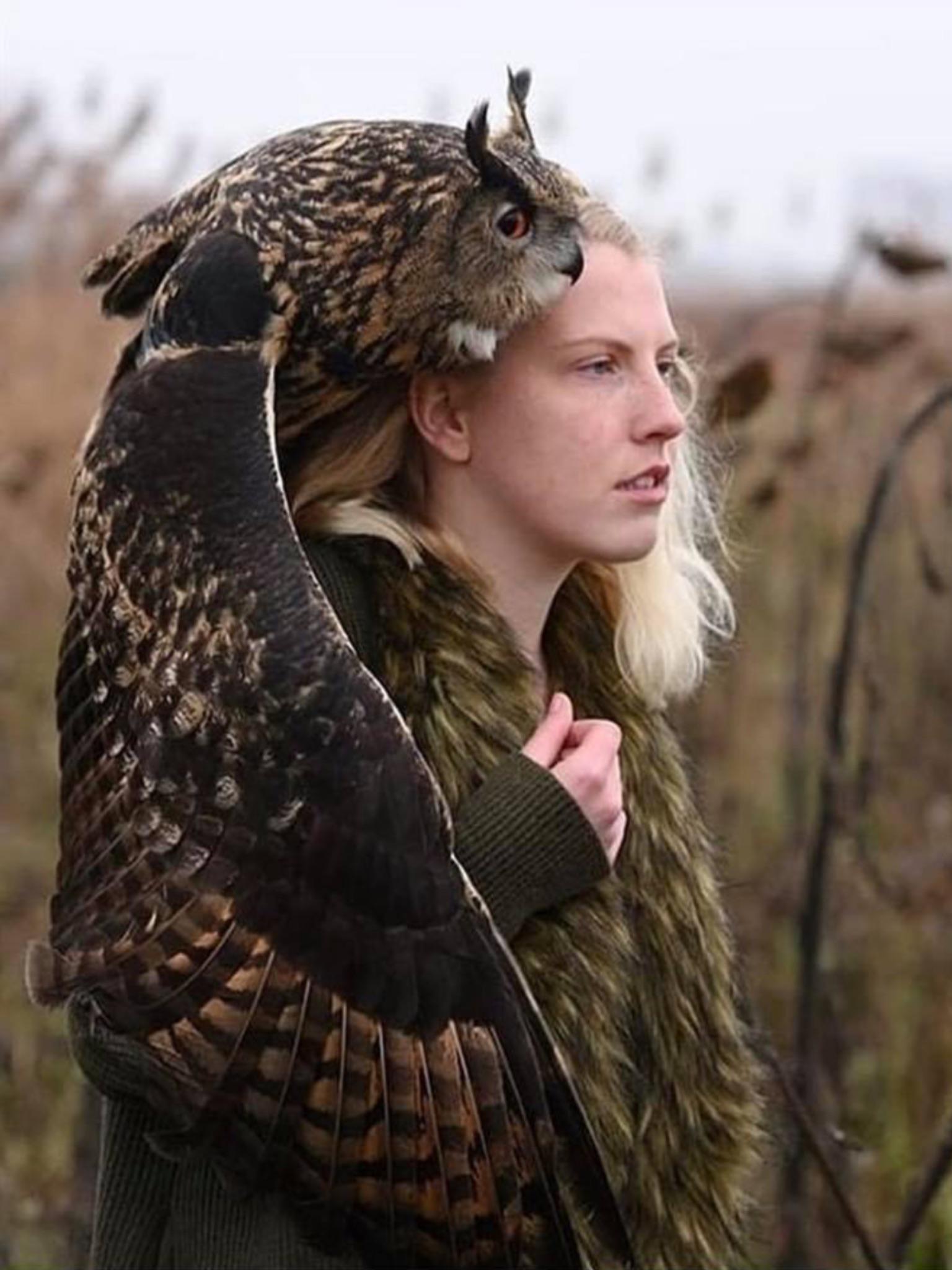 A woman with an Eagle Owl